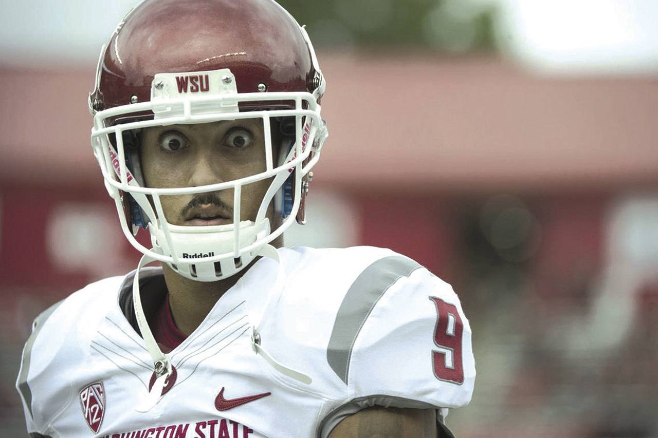 The Associated Press                                Washington State wide receiver Gabe Marks eyes the camera during the Cougars’ 37-34 victory over Rutgers last season. Marks caught 104 passes for 1,192 yards and 15 touchdowns in 2015.