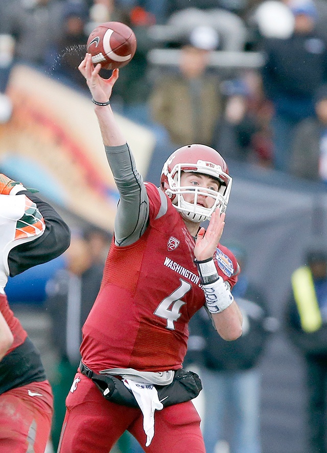 The Associated Press                                Washington State quarterback Luke Falk throws in the Sun Bowl against Miami in El Paso, Texas last December.