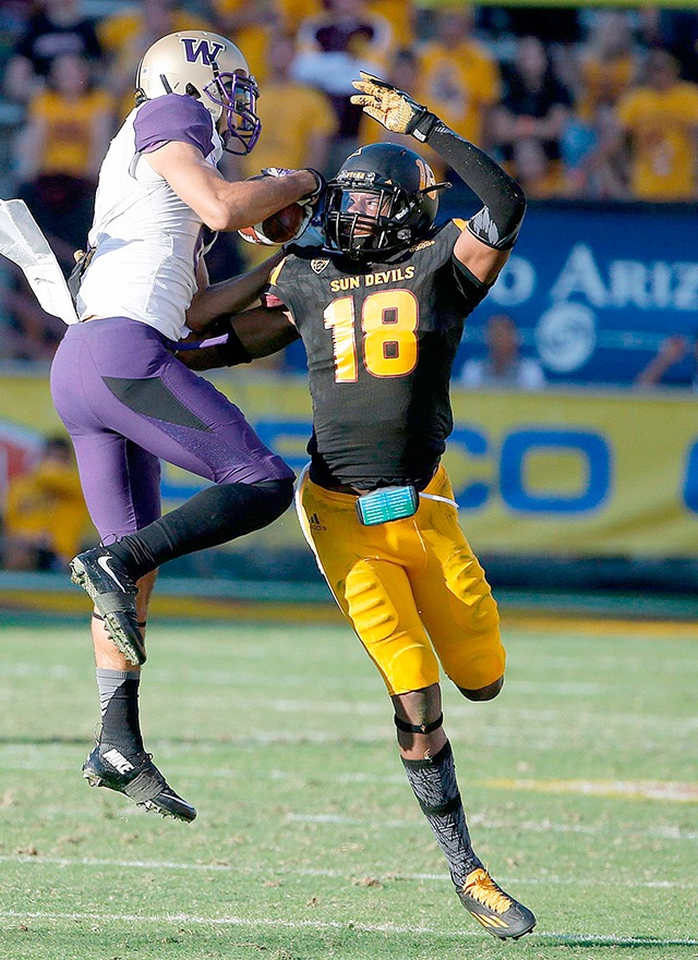 The Associated Press                                Washington wide receivers like Dante Pettis, left, are working to win more up-for-grabs passes like this one in last year’s game against Arizona State.