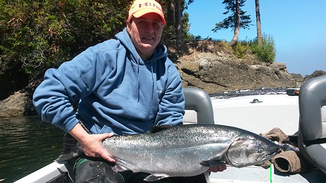 Pete Rosko                                Liz Thomson of Port Angeles caught this hatchery chinook on a 1½-ounce green-white pearl Kandlefish jig off Freshwater Bay last Sunday.