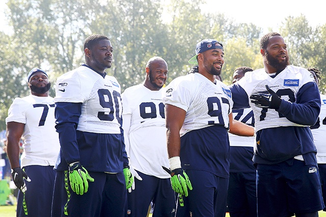 The Associated Press Seattle defensive linemen including Jarran Reed (90) Jordan Hill (97) and Michael Bennett (72) joke between drills at a recent practice.