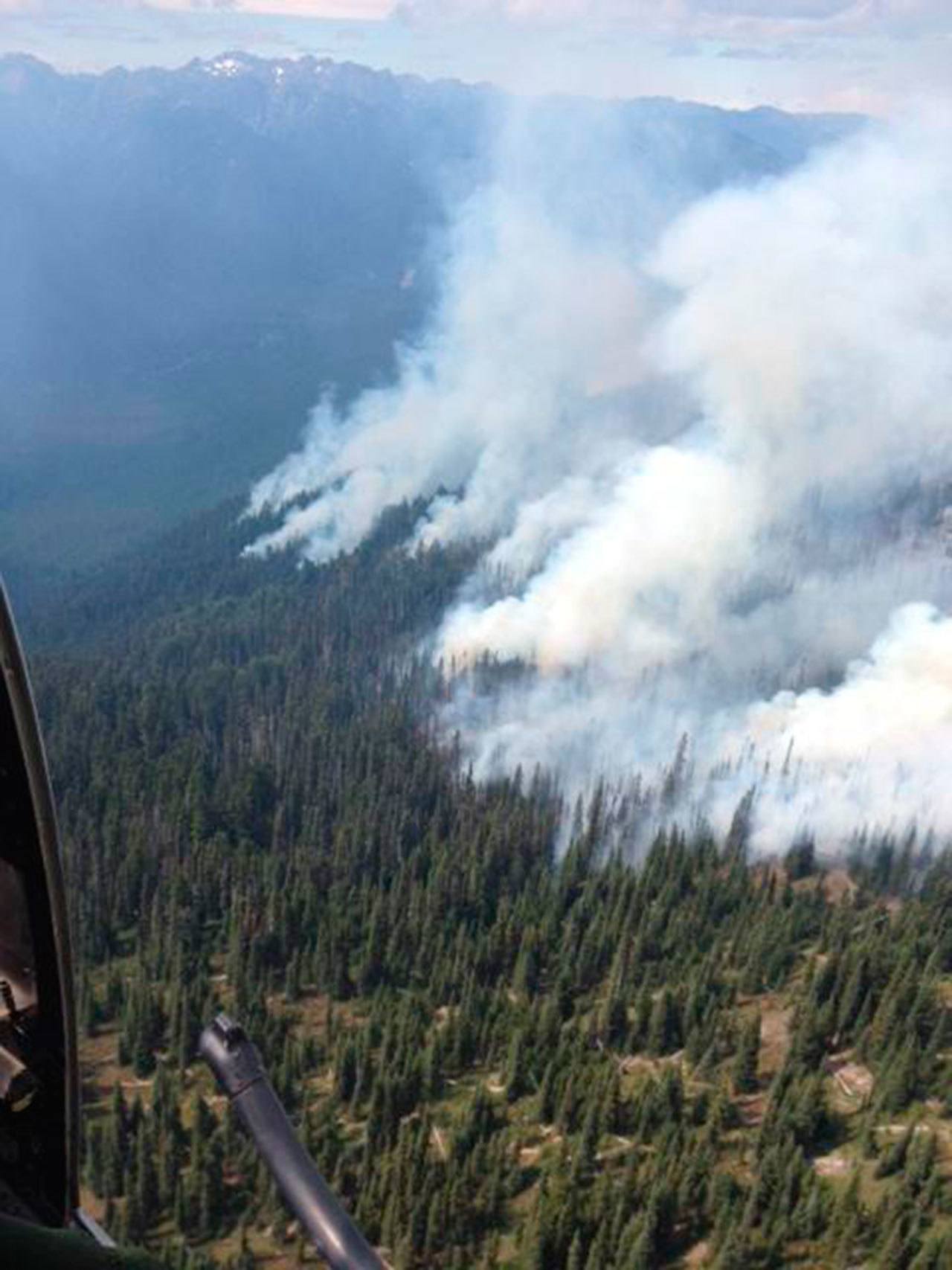 The Godkin fire sends up smoke as seen from a recon flight Sunday. (National Park Service)