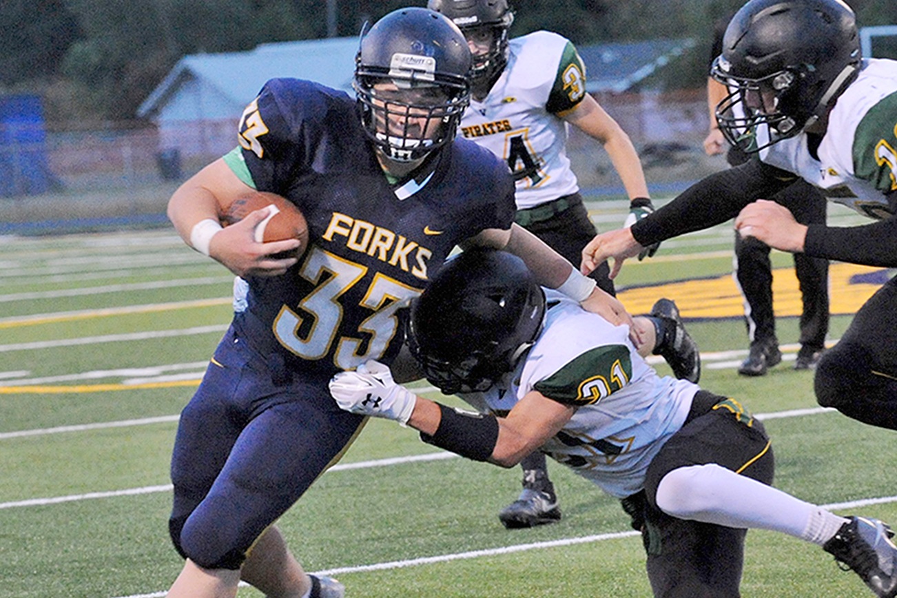 PREP FOOTBALL ROUNDUP: Forks hammers Vashon on new turf … and other area reports