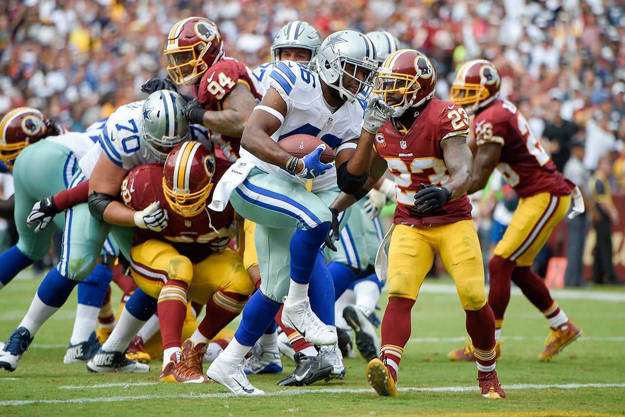 Dallas Cowboys running back Alfred Morris (46) carries the ball into the end zone for a touchdown past Washington Redskins free safety DeAngelo Hall (23) during the second half of an NFL football game in Landover, Md., Sunday, Sept. 18, 2016. (AP Photo/Nick Wass)