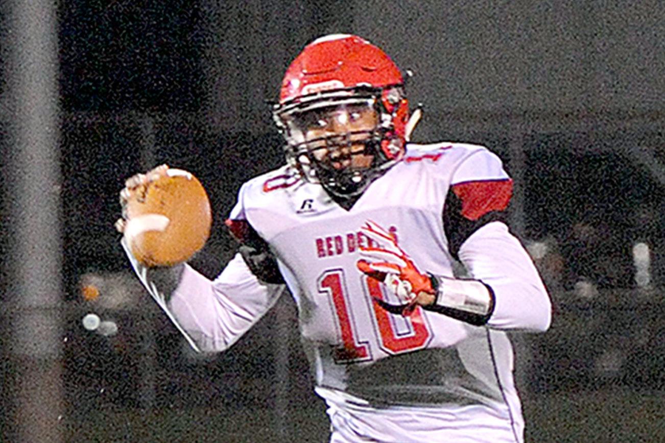 PREP FOOTBALL: Neah Bay sneaks past Forks in overtime