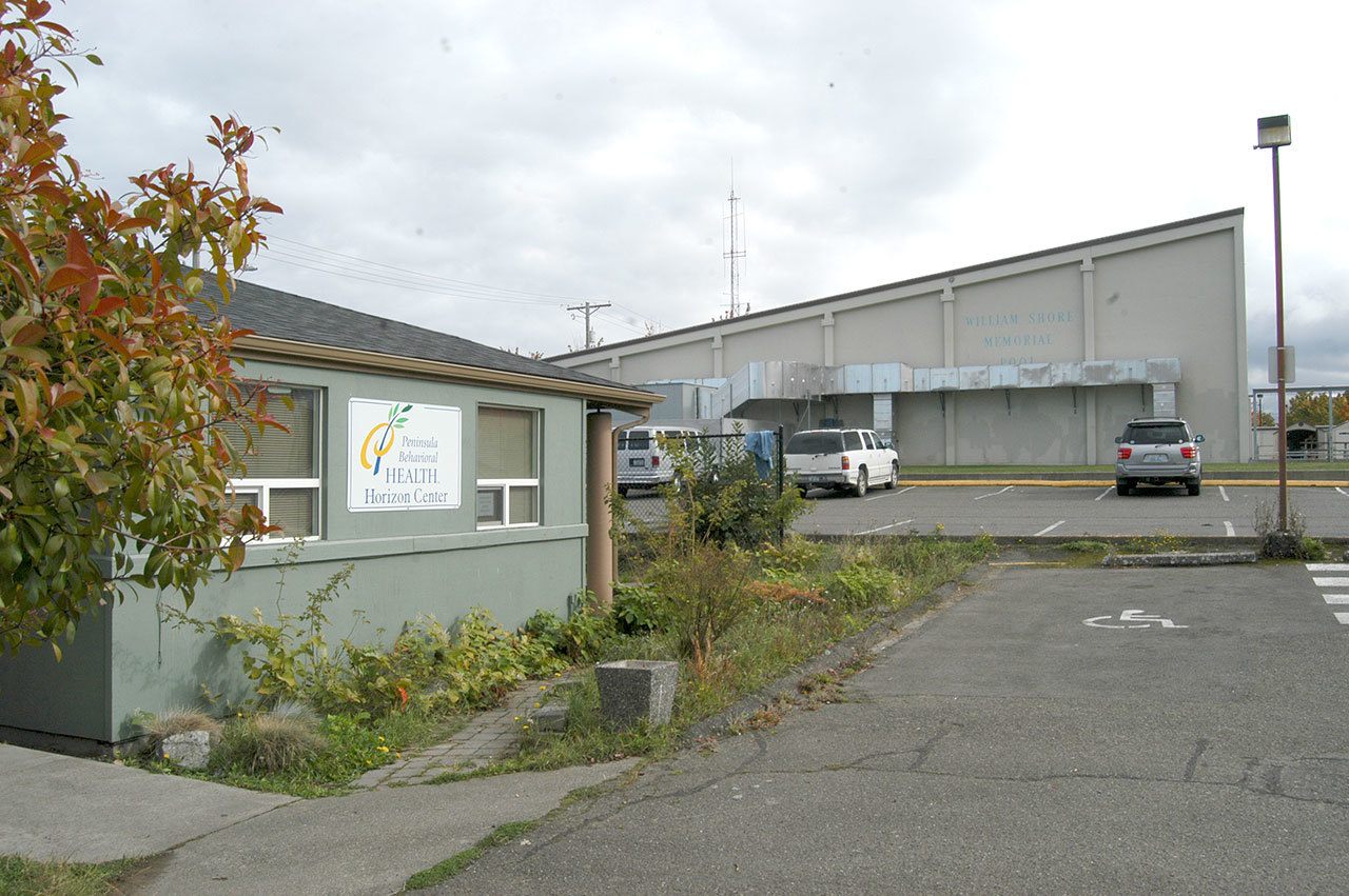 The Peninsula Behavioral Health Horizon Center at 205 E. Fifth St. is shown near the William Shore Memorial Pool. Clallam County commissioners are considering an agreement to transfer ownership of the building to allow the pool to expand. (Rob Ollikainen/Peninsula Daily News)