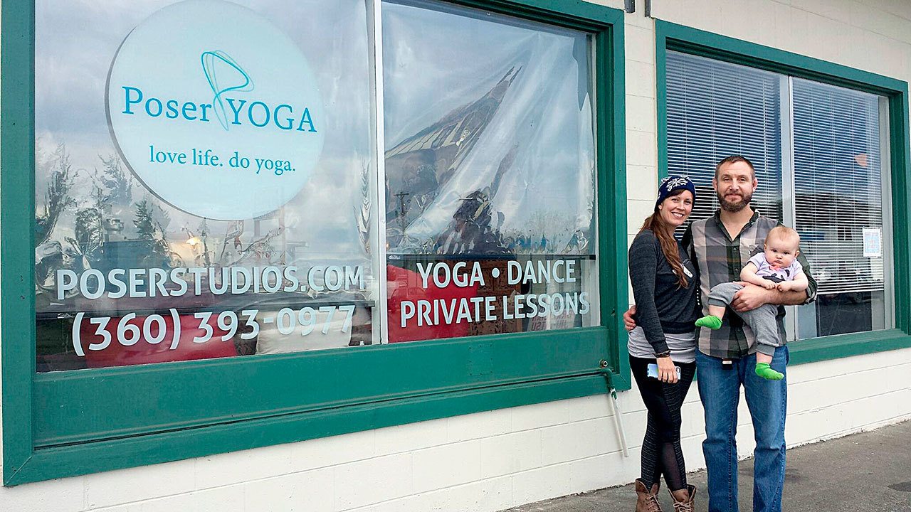 Jenny and Cody Houston in front of Poser Yoga.