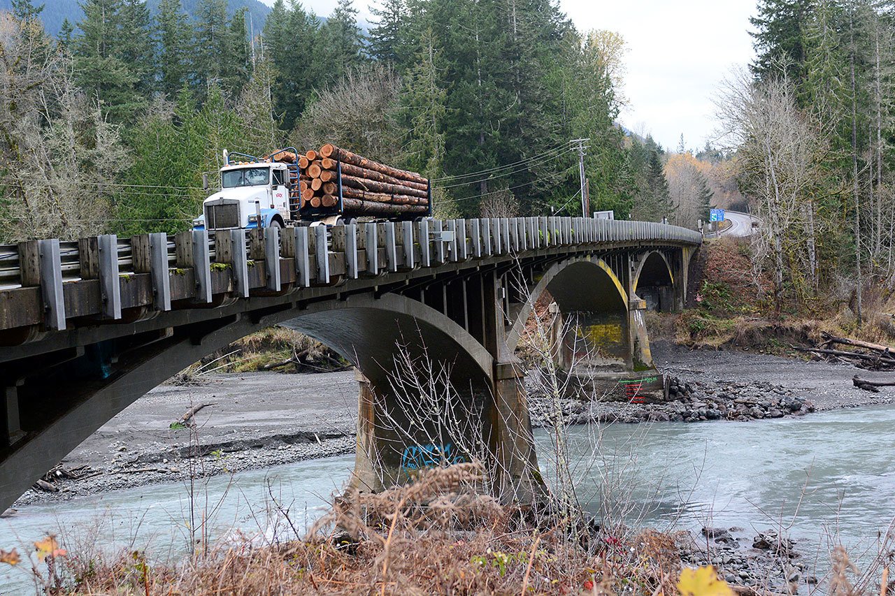 State Department of Transportation officials told some 60 government officials and local leaders Tuesday that WSDOT is still exploring options for the Elwha River bridge on U.S. Highway 101 after discovering it was built on gravel and not bedrock. (Jesse Major/Peninsula Daily News)