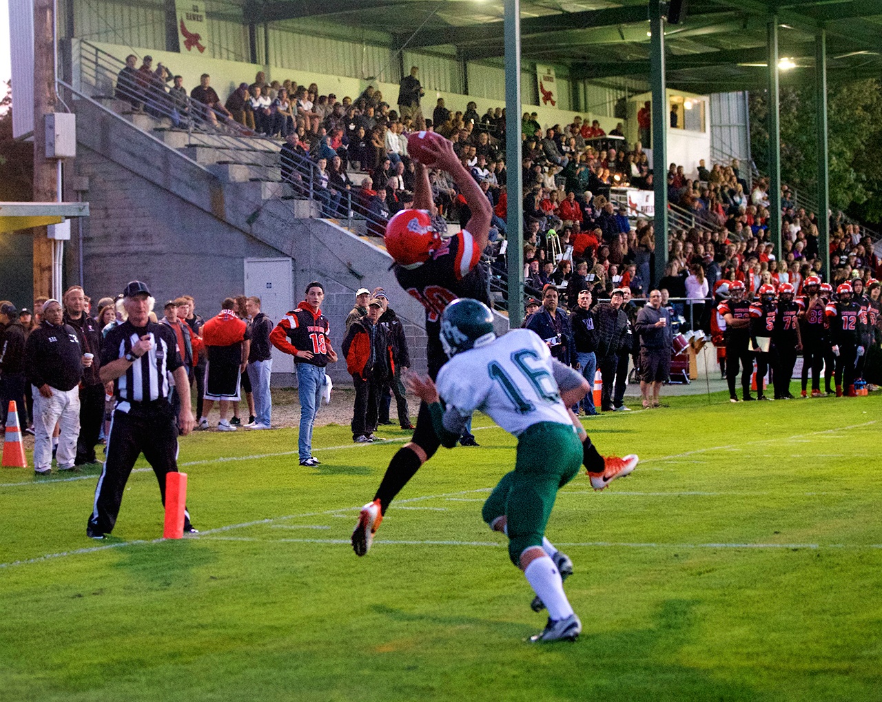 Steve Mullensky/for Peninsula Daily News                                Port Townsend’s Detrius Kelsall (10) beats out Port Angeles’ Easton Joslin for a touchdown reception during a game earlier this season.