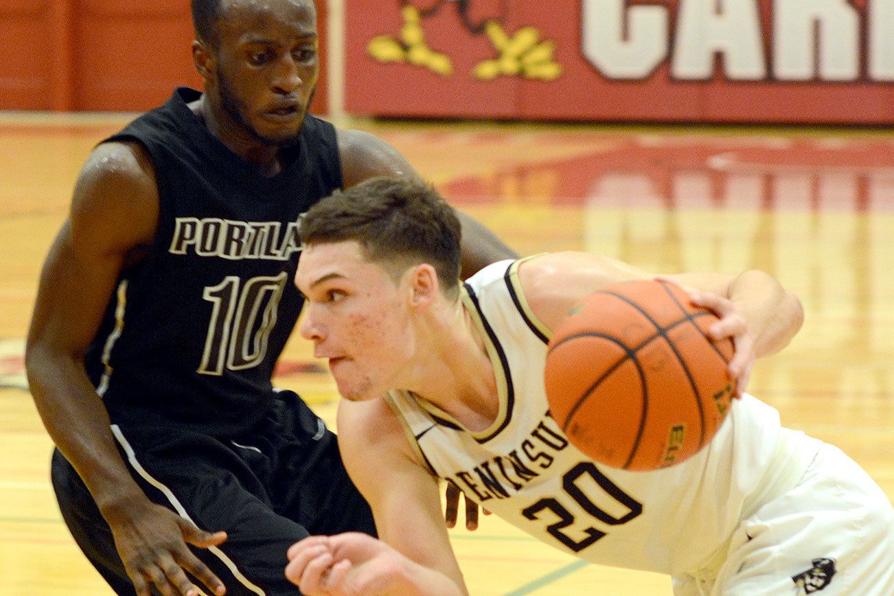 COLLEGE BASKETBALL: Peninsula men split a pair at Skagit tournament