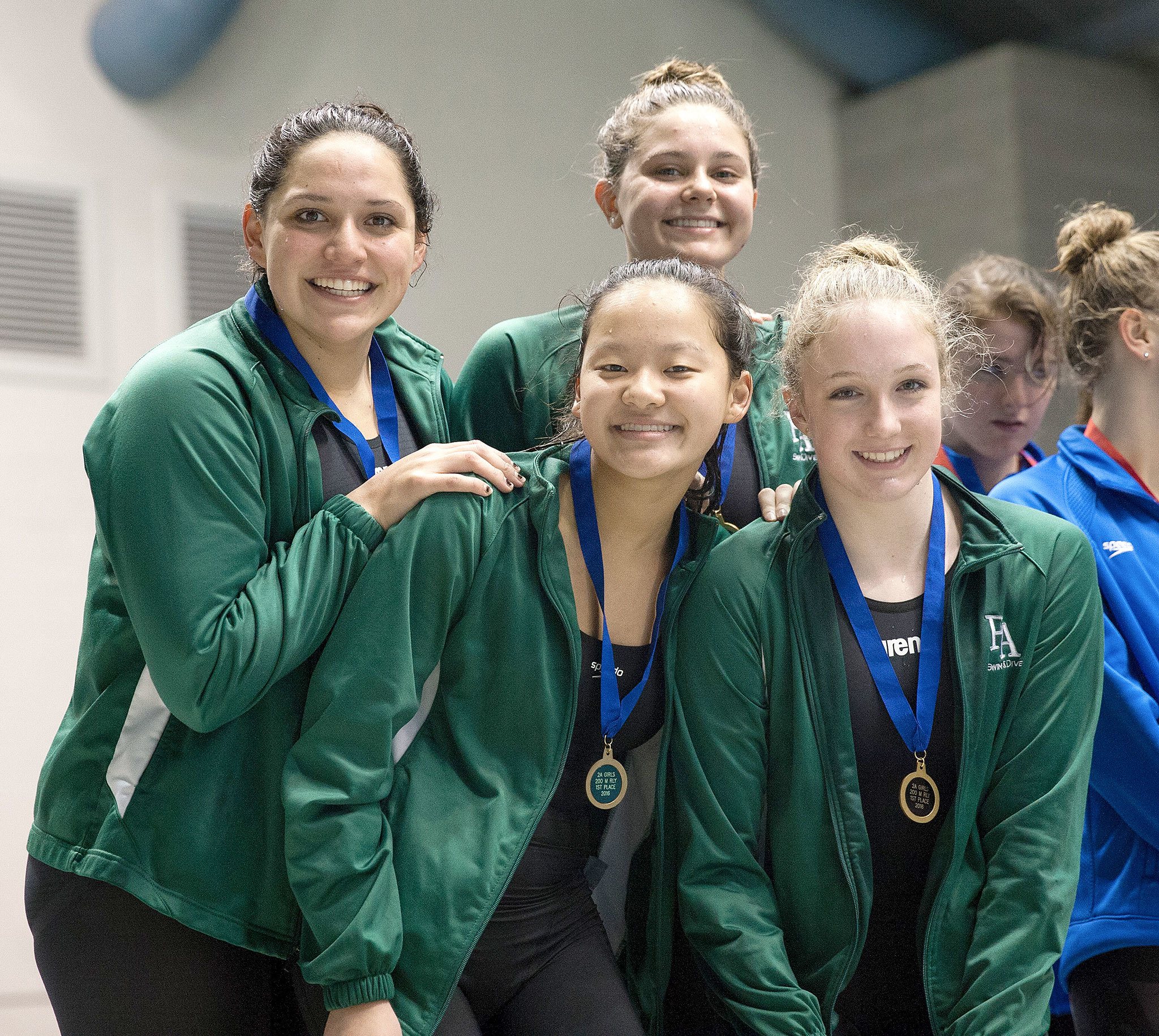 Port Angeles High School                                From left in back are Jaine Macias and Kenzie Johnson. From left in front are Felicia Che and Nadia Cole. The Port Angeles foursomewon the 200 medley relay race at the state 2A swim meet and came in fourth in the 200 freestyle relay. For their accomplishments,they are Peninsula’s swimming co-MVPs.