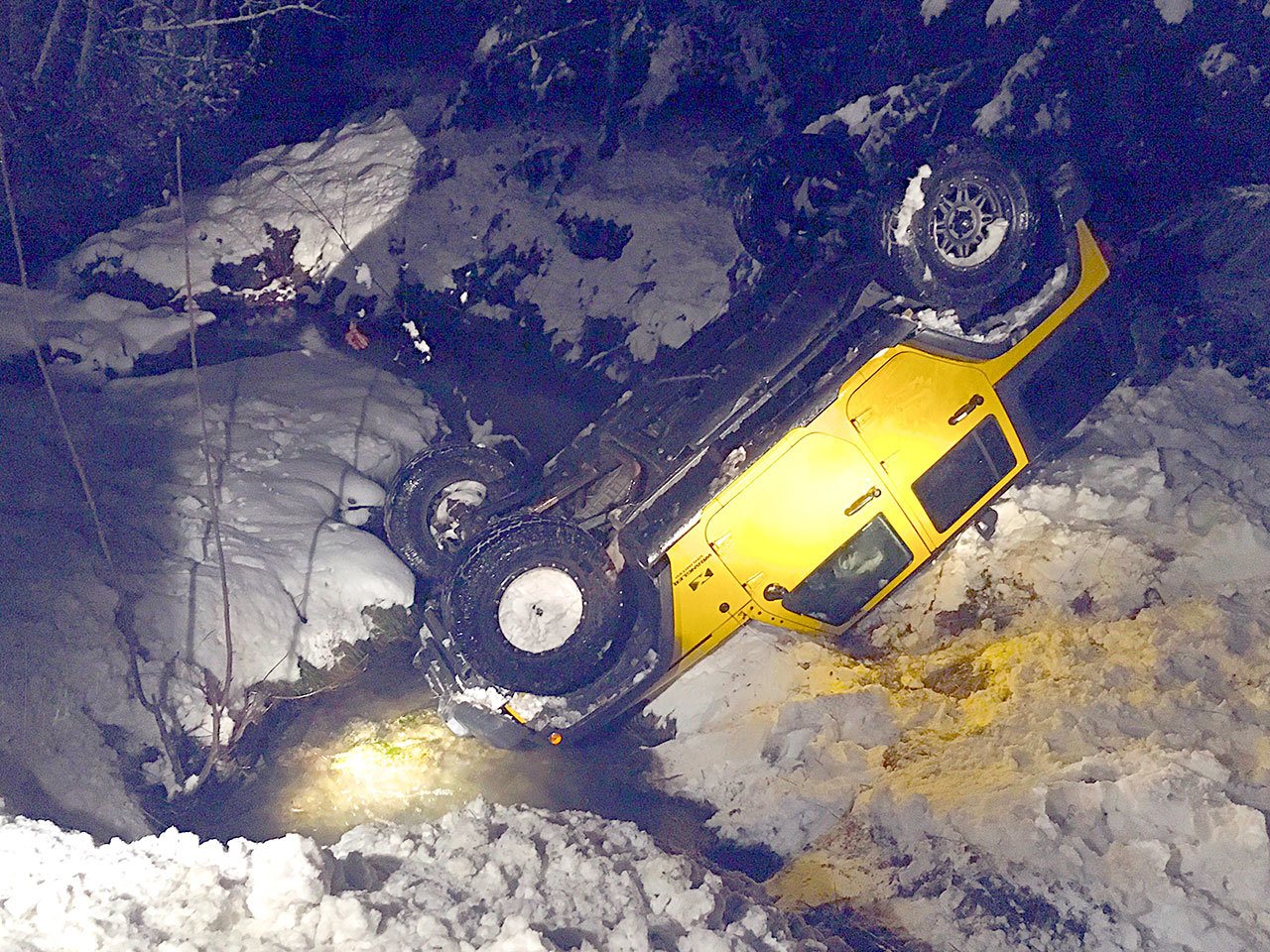 A Jeep Wrangler slid off Black Diamond Road late Friday afternoon. No one was hurt, fire department officials said. (Clallam County Fire District No. 2)