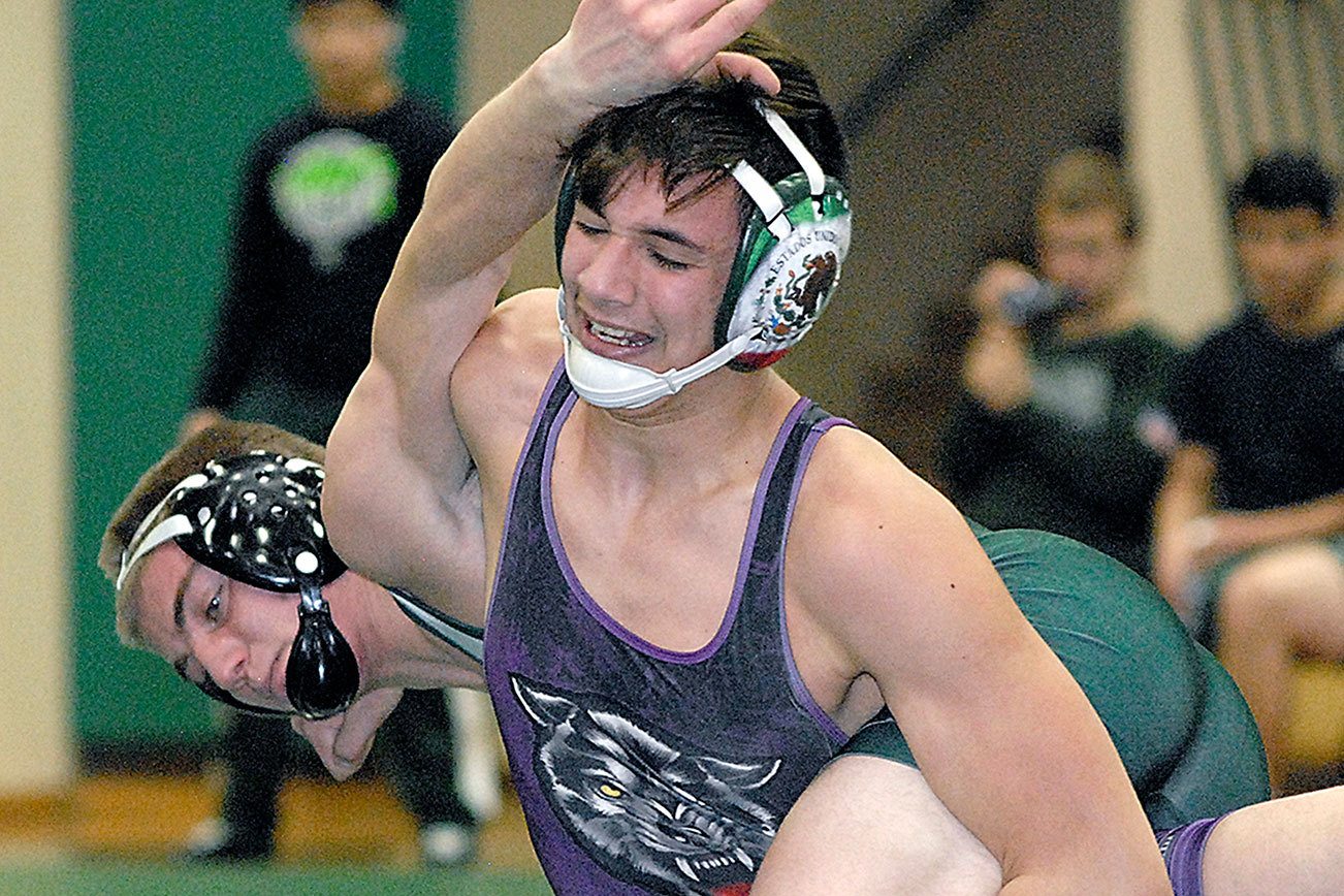WRESTLING Sequim grapplers win the Battle of the Axe Peninsula Daily