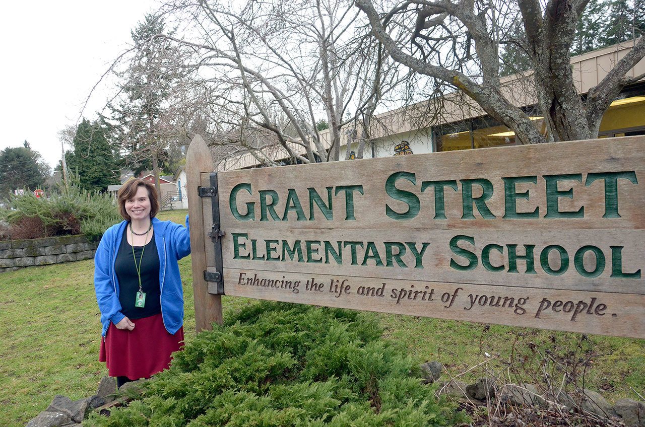 Grant Street Elementary School Principal Lisa Condran stands in front of the elementary school that will get a new building and new name for the 2018-19 school year. (Cydney McFarland/Peninsula Daily News)