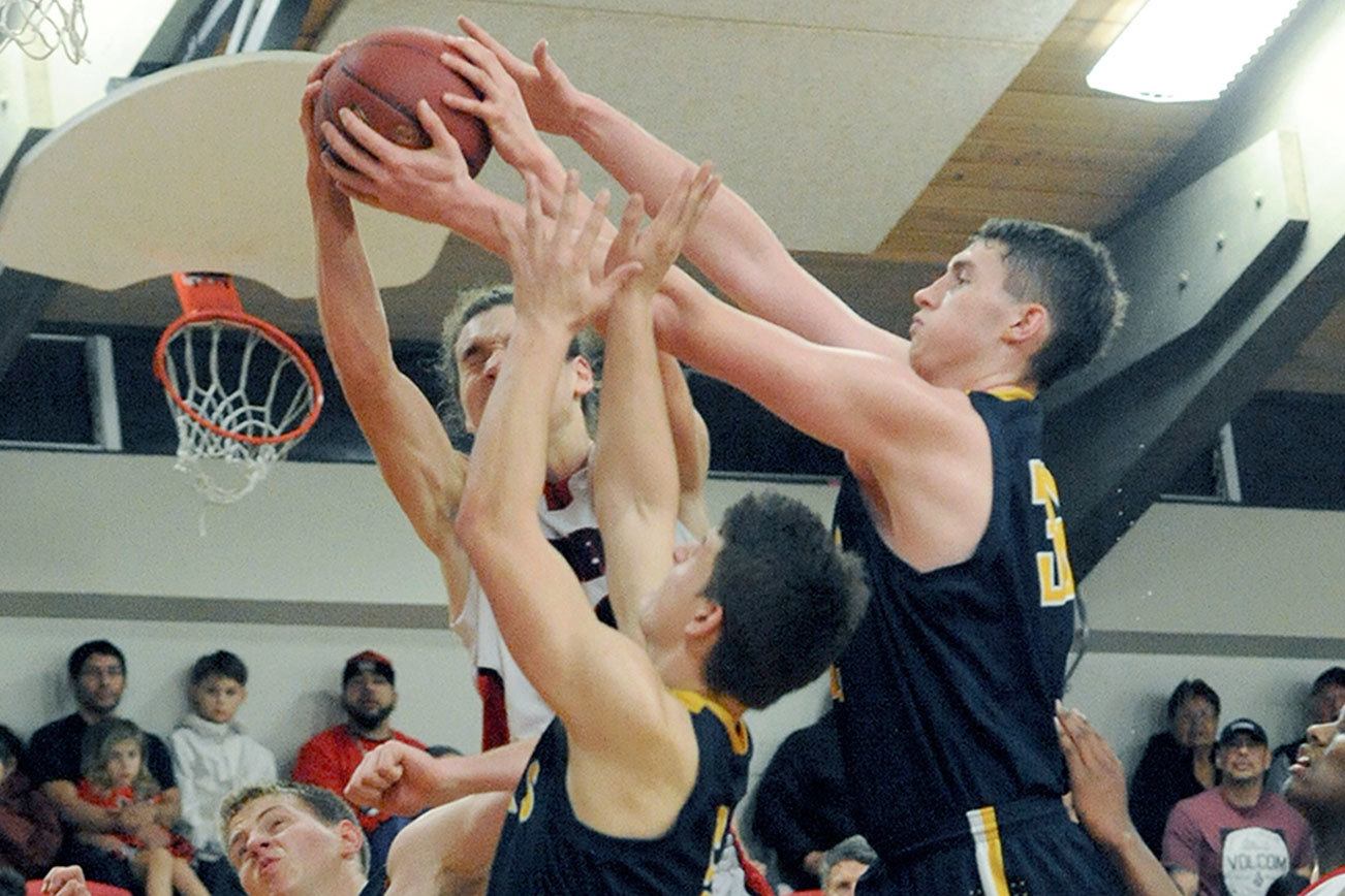 BOYS BASKETBALL: Neah Bay clamps down, wins thriller over Forks