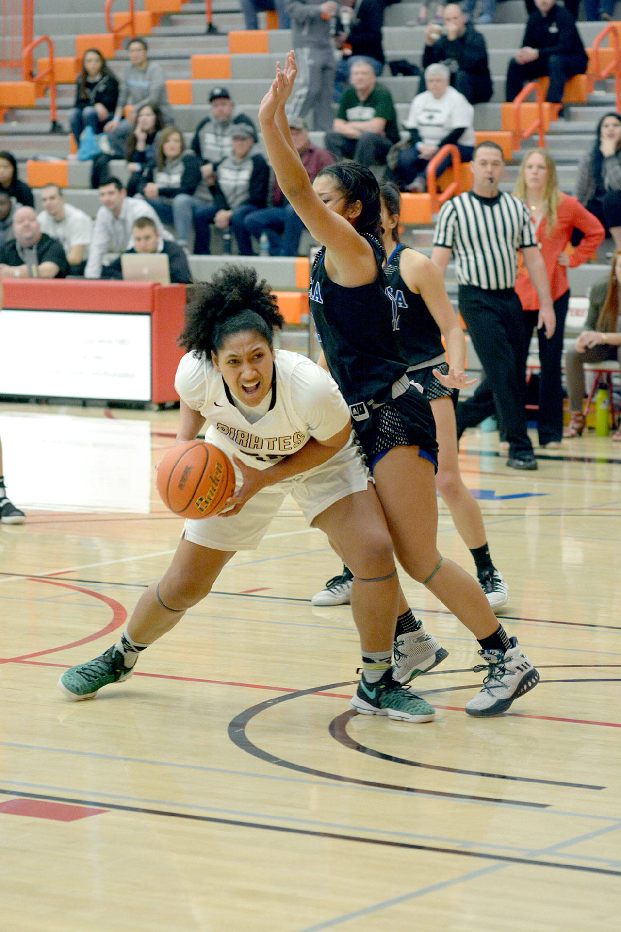 Rick Ross/Peninsula College                                Peninsula’s Taisha Thomas looks to pass against Tacoma in Peninsula’s 69-61 opening round win in the NWAC Tournament.