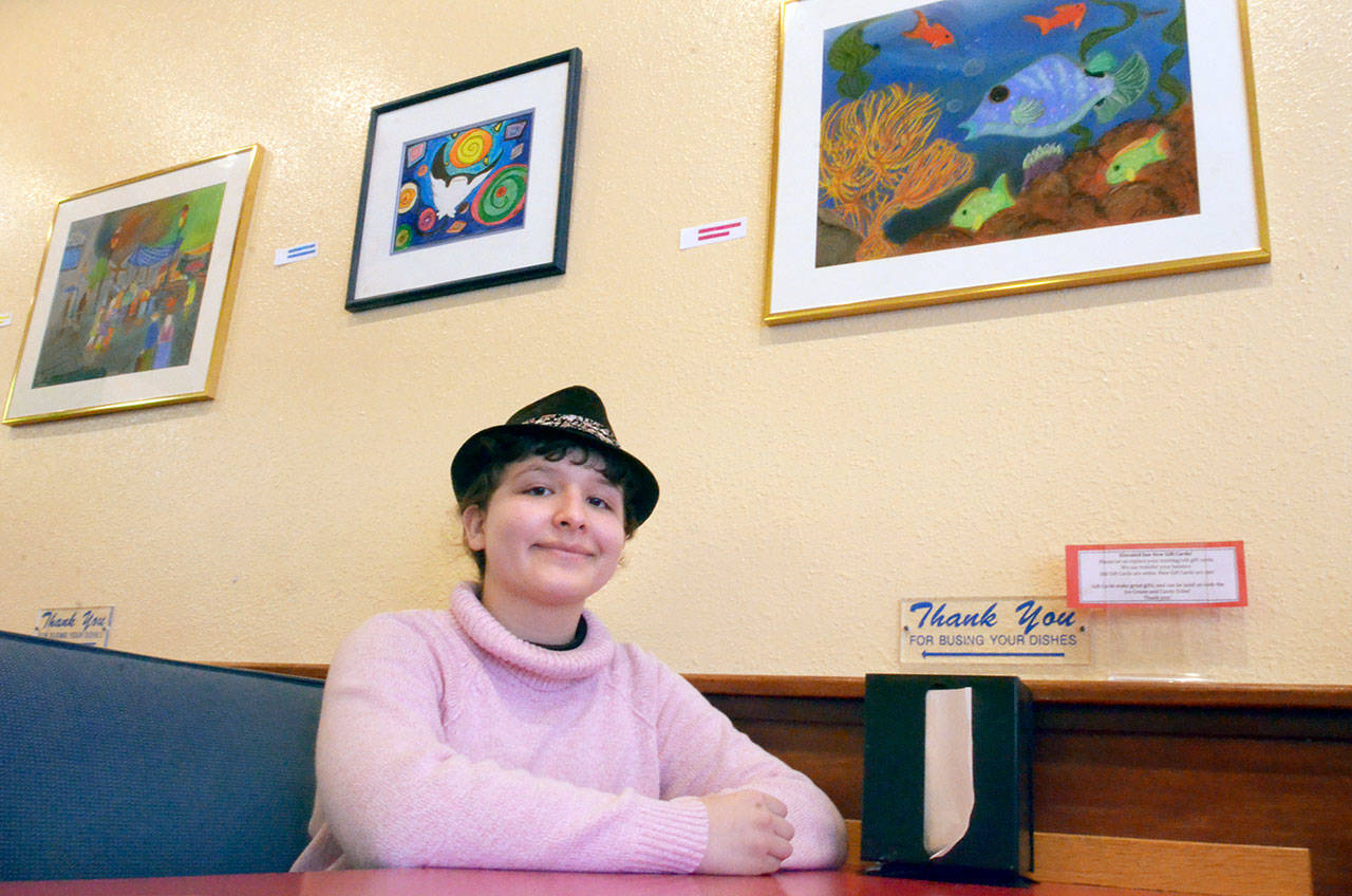 Aloura Remy, a 13-year-old artist from Port Townsend, is using her art to raise money for Dove House all this month. (Cydney McFarland/Peninsula Daily News)