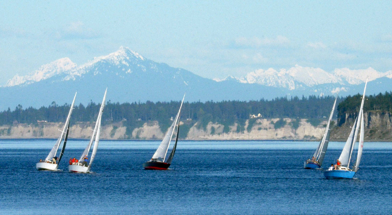 Sailboats take over Port Townsend Bay on Friday for the second weekly sailboat race, which kicks off spring racing season. (Cydney McFarland/Peninsula Daily News)