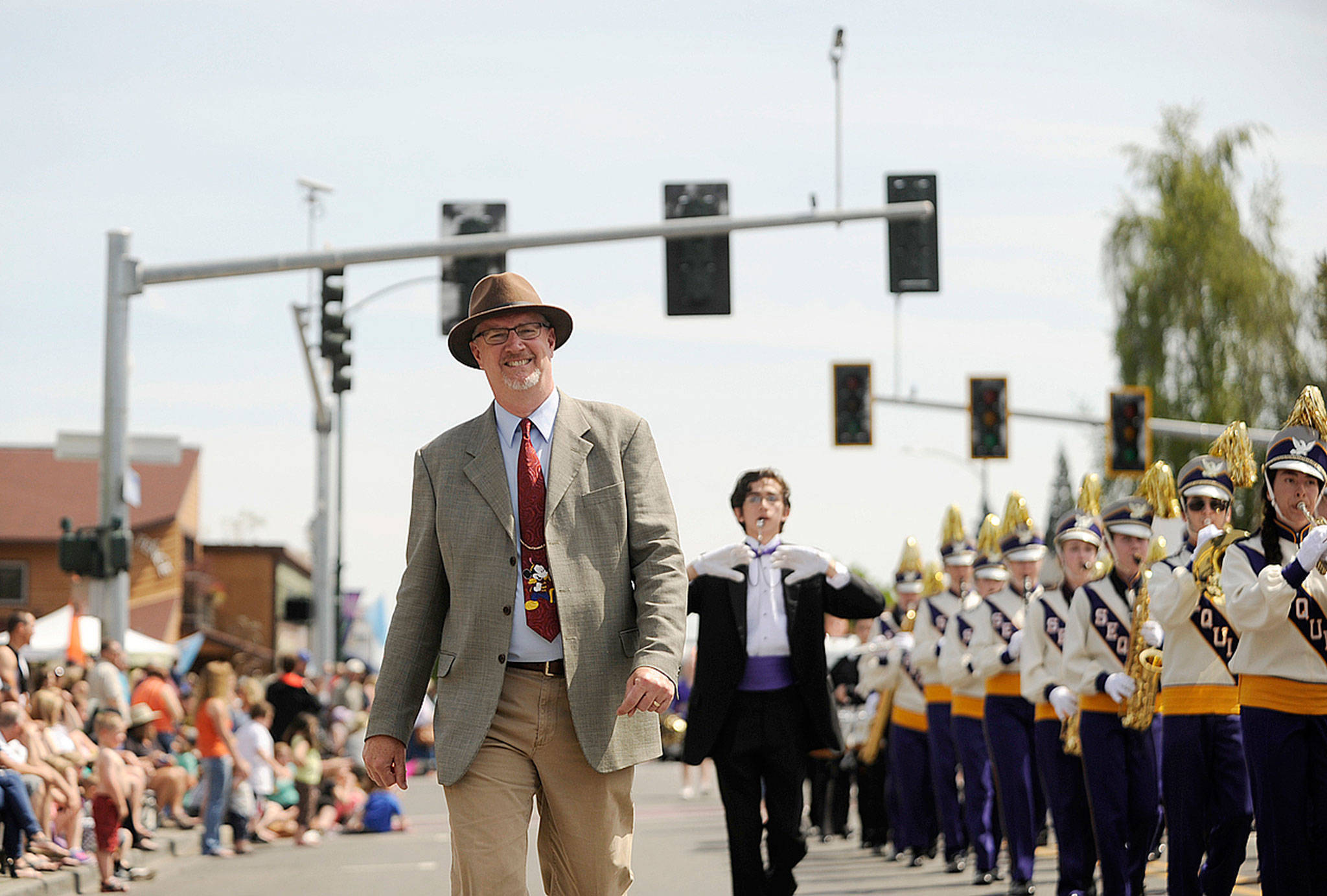 Rather than marching in this year’s Sequim Irrigation Festival Grand Parade, Sequim High School band director Vern Fosket, seen here in the 2015 parade, will ride in style in a convertible May 13 along Washington Street as the festival’s Grand Marshal. (Michael Dashiell/Olympic Peninsula News Group)