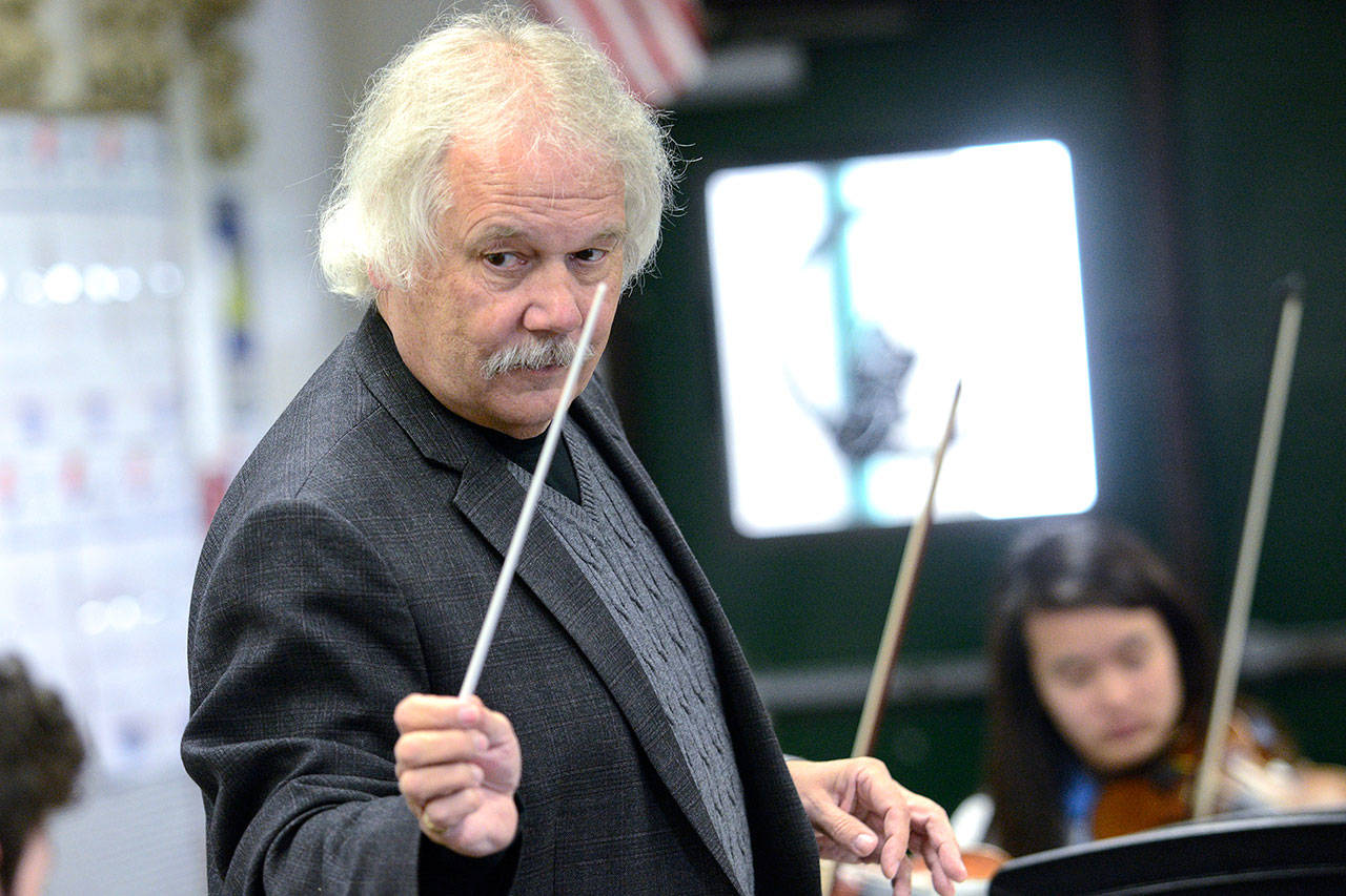 Longtime Port Angeles orchestra teacher Ron Jones conducts the Port Angeles High School chamber orchestra Monday. Jones will retire at the end of this school year. (Jesse Major/Peninsula Daily News)