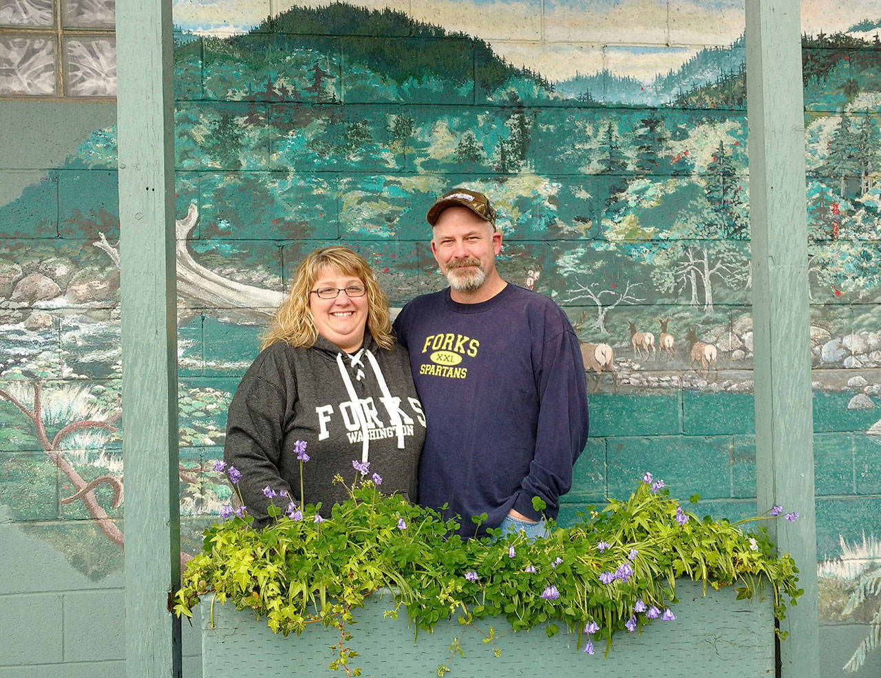 New Lake Pleasant Grocery co-owners Kris and Tom Hull. (Zorina Barker/for Peninsula Daily News)