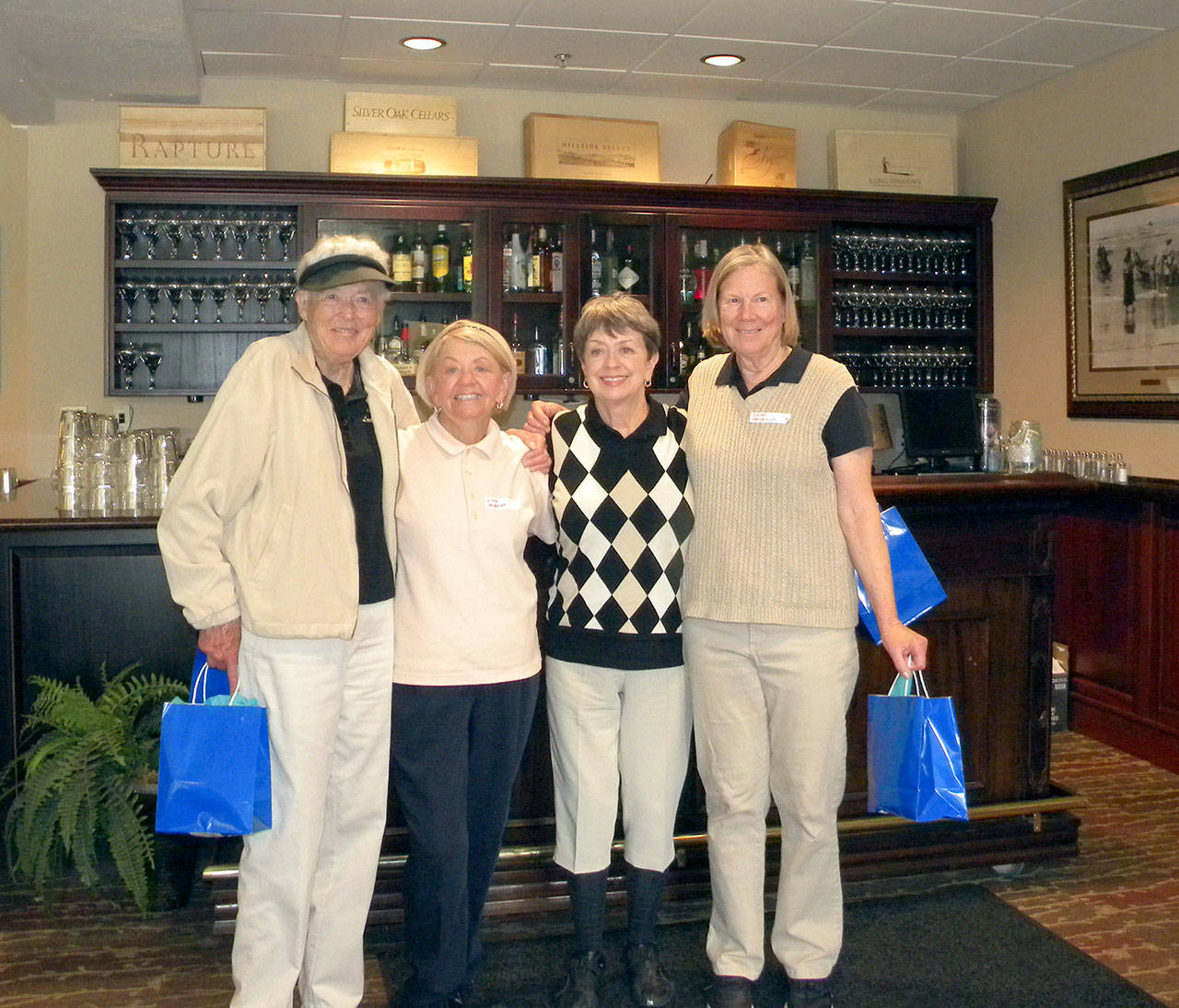 Earning first-place honors at The Cedars at Dungeness Lady Niners Memorial Tournament were, from left, Dot Forshee, Witta Priester, Sue Mobley and Kathy Benedict. The eighth annual event raised more than $4,000 for Volunteer Hospice of Clallam County.