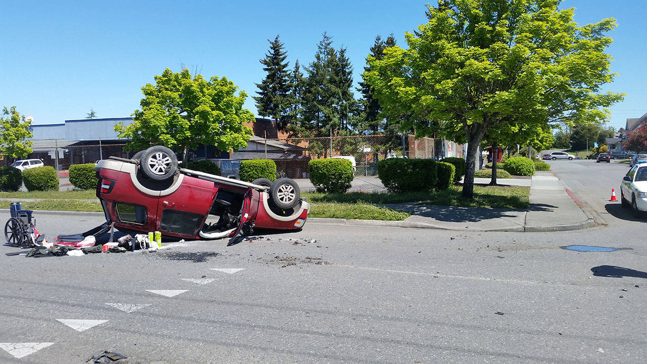 A Ford Explorer ended up on its roof following a two-vehicle rollover wreck Sunday at Second and Vine streets in Port Angeles. (Port Angeles Police Department)