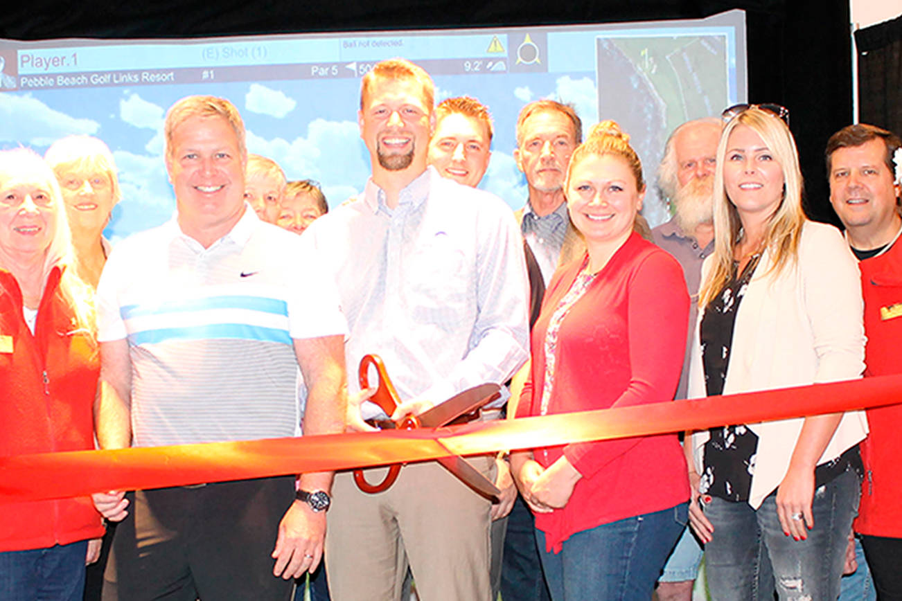 GOLF: Course simulator has ribbon cutting at Peninsula Golf Club