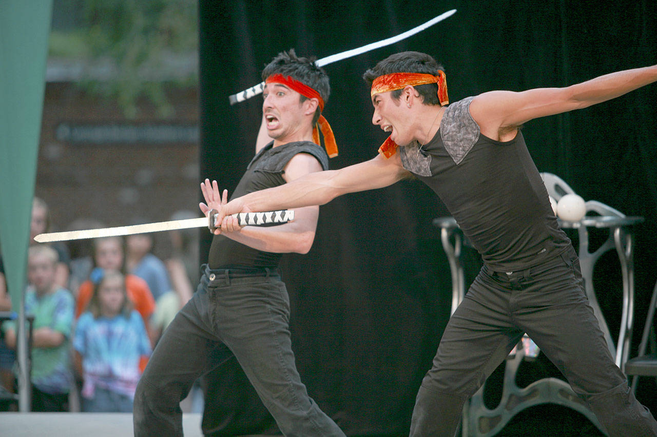 Kiyota Sage and Tomoki Sage show off their sword prowess in the upcoming performance of a four-man group called NANDA in Port Townsend. (David Levore)