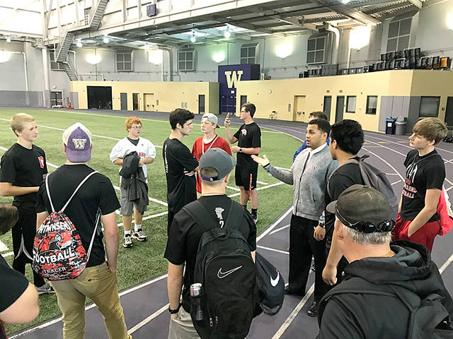 Port Townsend Football Port Townsend football players listen to Justin Glenn, director of high school relations for the University of Washington football program, describe features of the Dempsey Indoor Practice Facility during a recent tour.