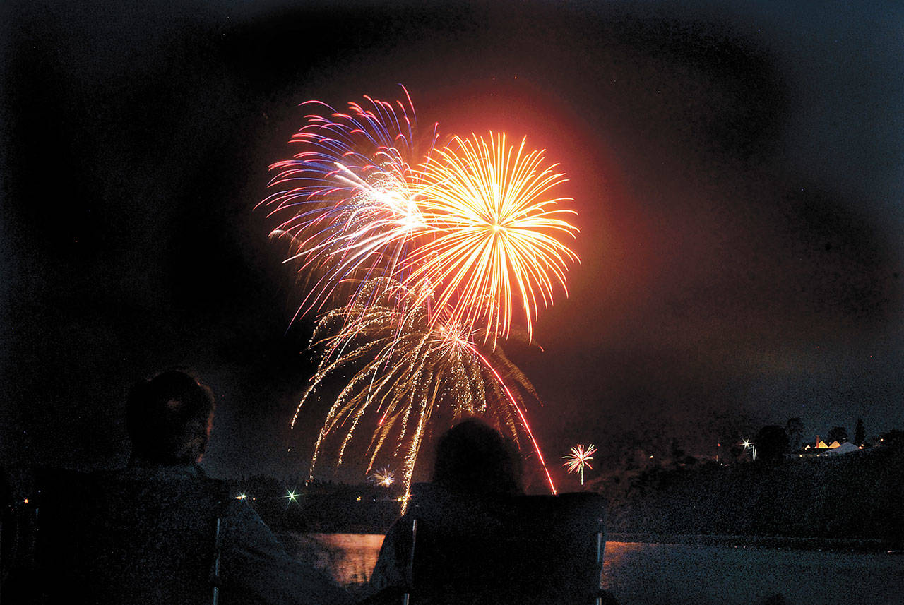 Fireworks explode over Port Angeles Harbor during last year’s annual Independence Day display. (Keith Thorpe/Peninsula Daily News)