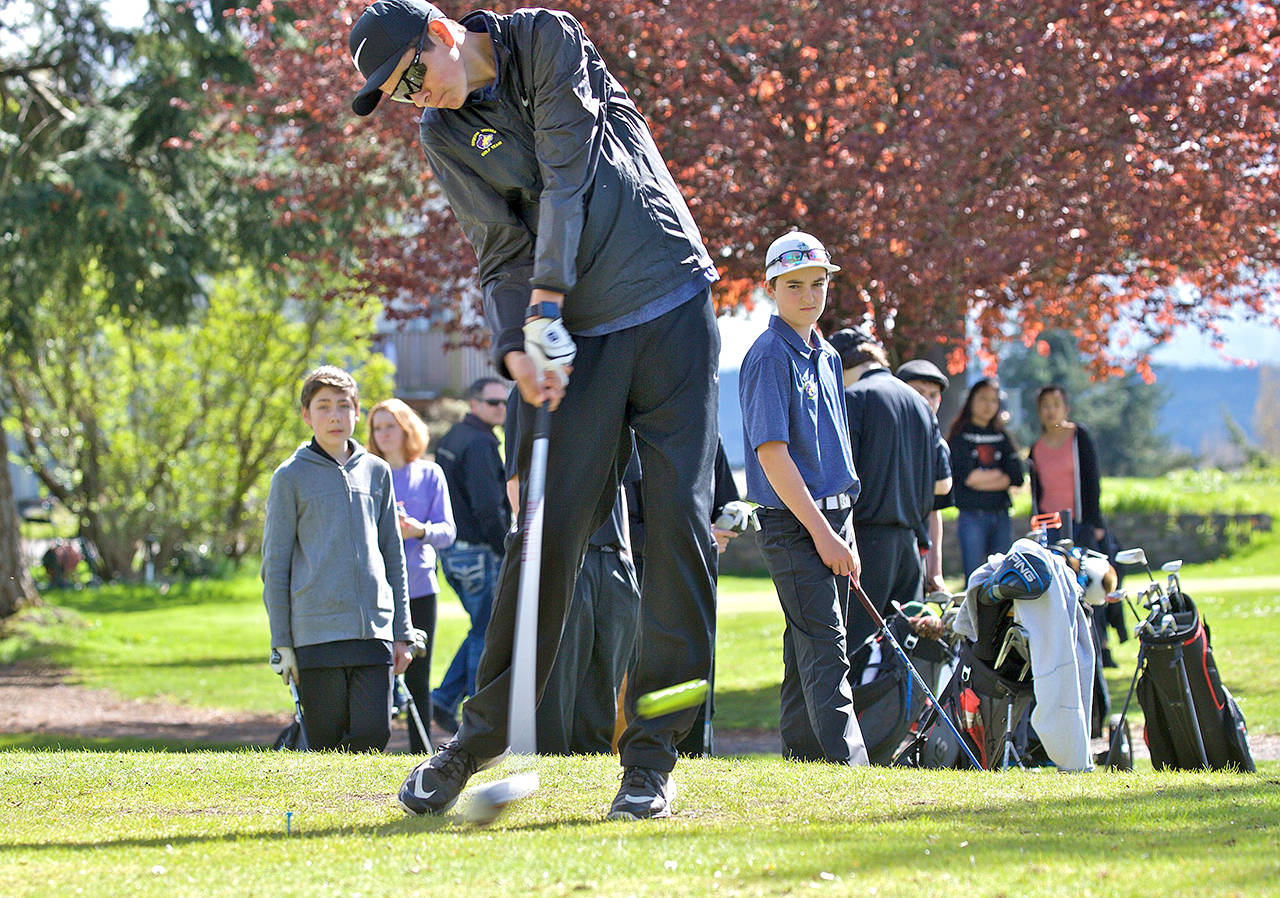 Steve Mullensky/for Peninsula Daily News                                Sequim’s Blake Wiker tees off during a match against Port Townsend. Wiker, a sophomore, is the All-Peninsula Boys Golf MVP.