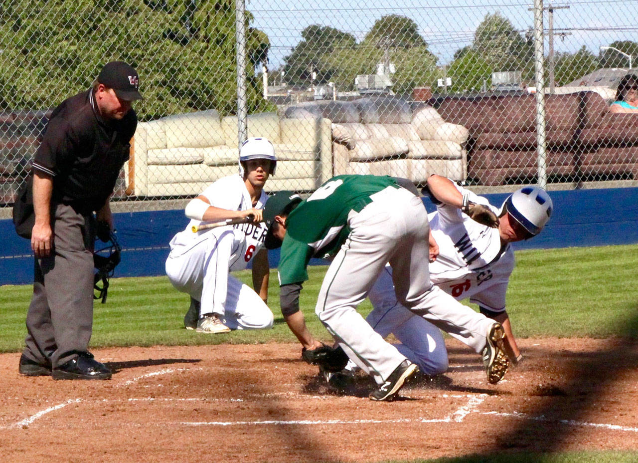 Dave Logan/for Peninsula Daily News                                Matt Hendry of Wilder Senior (16) is out at home in a play at the plate against Lakeside Recovery as Lakeside pitcher Brendan Maltos applies the tag. Watching on the play is Wilder’s Bo Bradow (6). Wilder was able to come from behind then hold on to win the Firecracker Invitational championship 5-4.