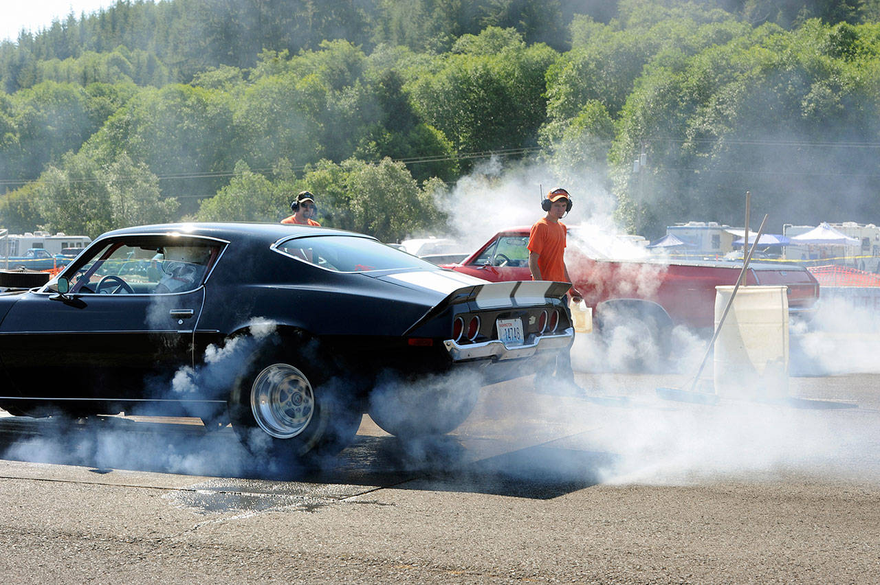 Cary Borum, in front, and Ron Clark both of Forks burn to the starting line of a recent West End Thunder race. (Lonnie Archibald/for Peninsula Daily News)