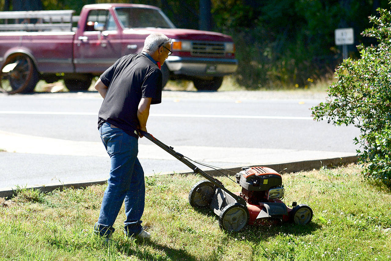 David, who asked not to include his last name, works at Serenity House on Monday as part of the nonprofit’s program aimed at putting panhandlers to work. (Jesse Major/Peninsula Daily News) ​