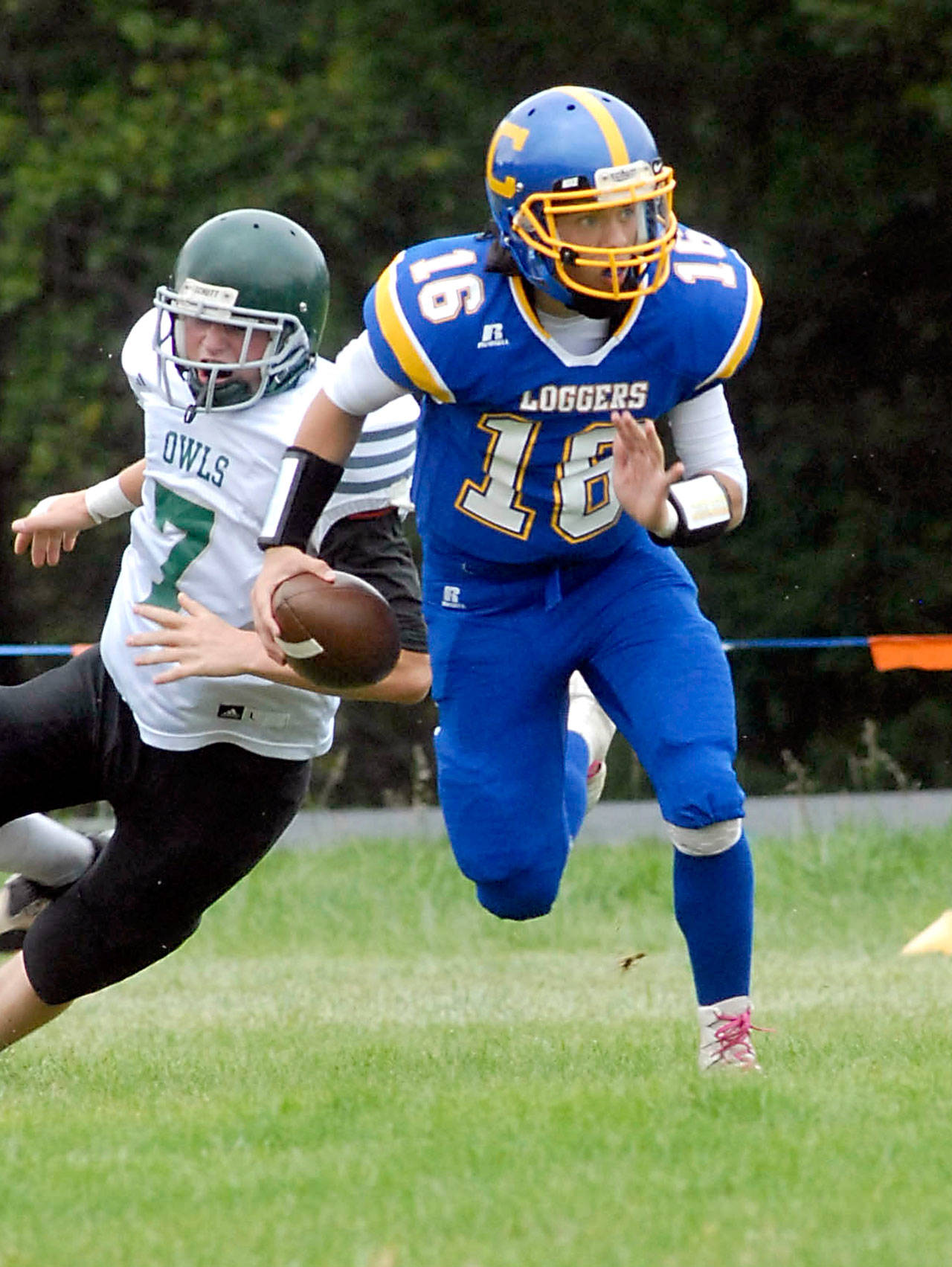 Crescent’s KC Spencer rushes in a game against Mary M. Knight last season. A senior, Spencer will be called on often to lead a youthful Loggers squad. Keith Thorpe/Peninsula Daily News