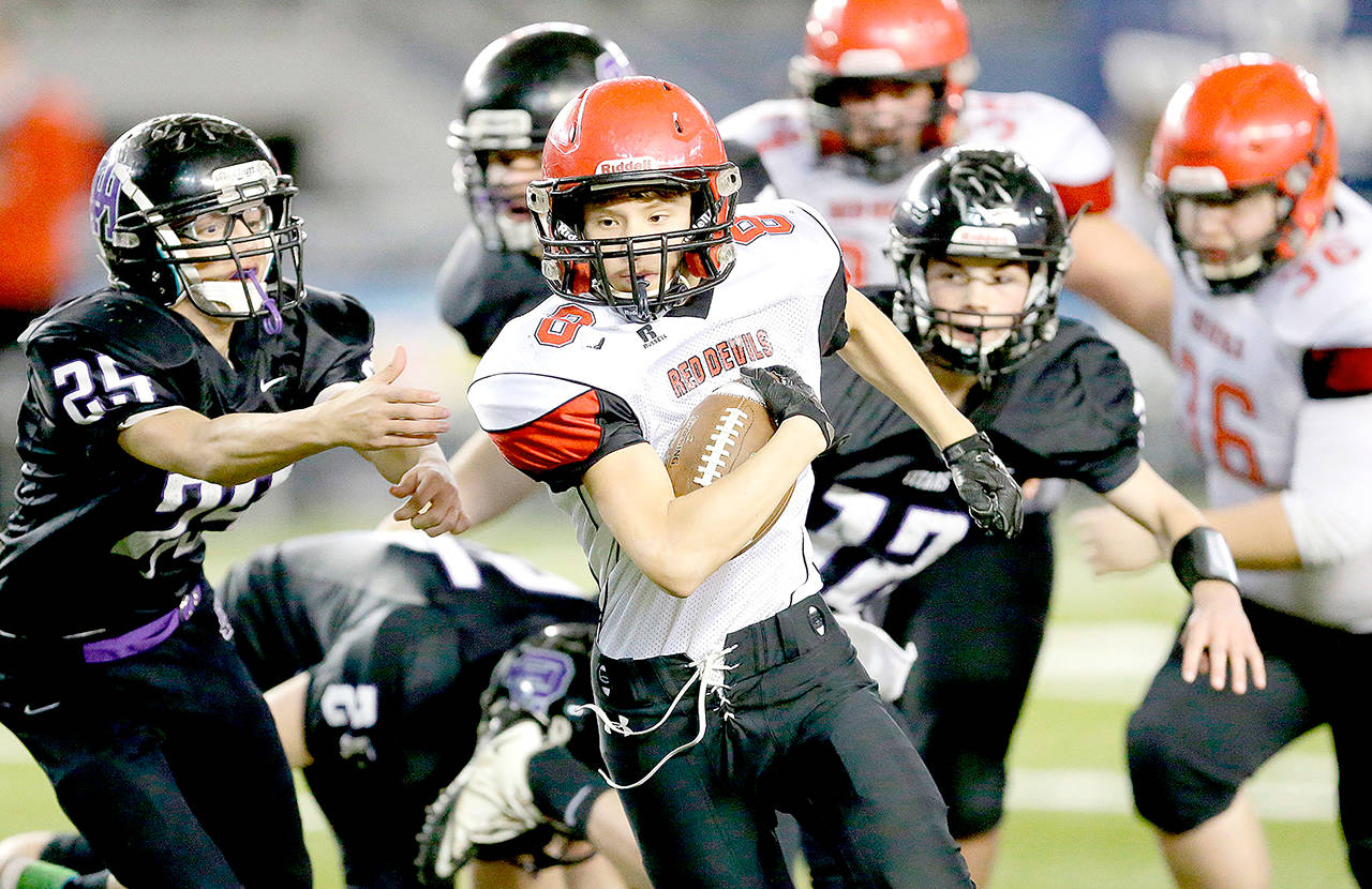 Neah Bay running back Logan Halttunen (8) runs for a 38-yard touchdown against Odessa-Harrington during the Class 1B state championship last December.                                The Associated Press