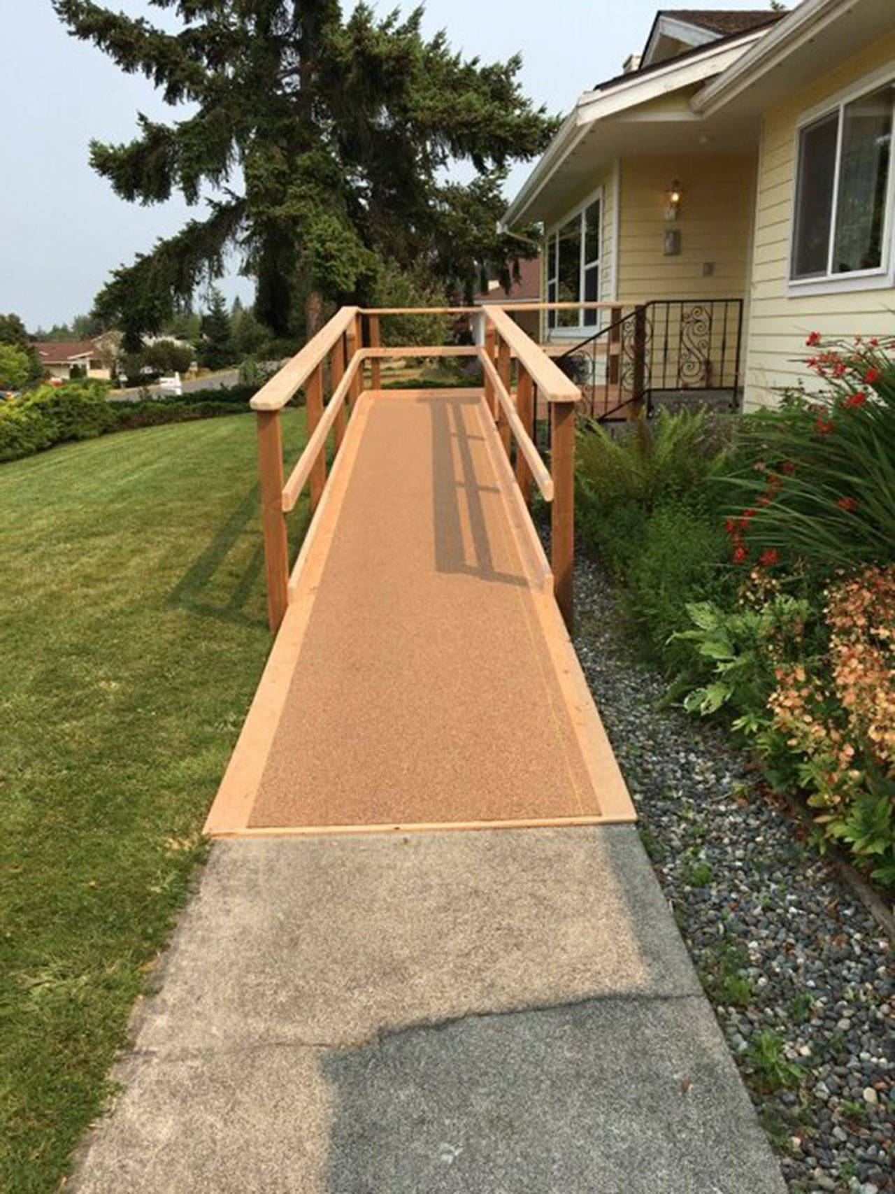 Over last weekend, members from the Sequim Sunrise Rotary Club, Sequim Food Bank and other volunteers built a ramp for Sawyer Streett to be ready for him upon his return home to Sequim. The volunteers also worked over the weekend to complete a list of 2017 yard projects Robert Streett had made to finish.