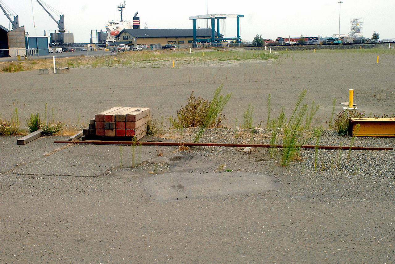 The site of the former KPly mill sits mostly vacant along the Port Angeles waterfront, but the Port of Port Angeles is hoping for an unnamed marine trades company to commit to using the location. (Keith Thorpe/Peninsula Daily News)