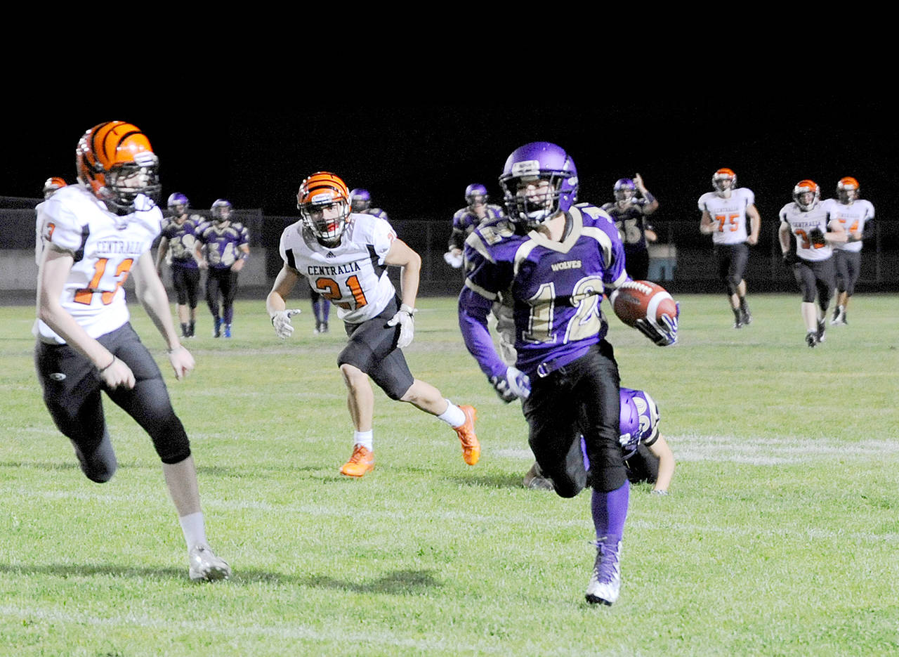 Sequim’s Kyler Rollness breaks free for a 36-yard reception late in the fourth quarter of Sequim’s 23-22 win over Centralia on Friday. Rollness had nine catches for 141 yards and a touchdown.                                (Michael Dashiell/Olympic Peninsula News Group)