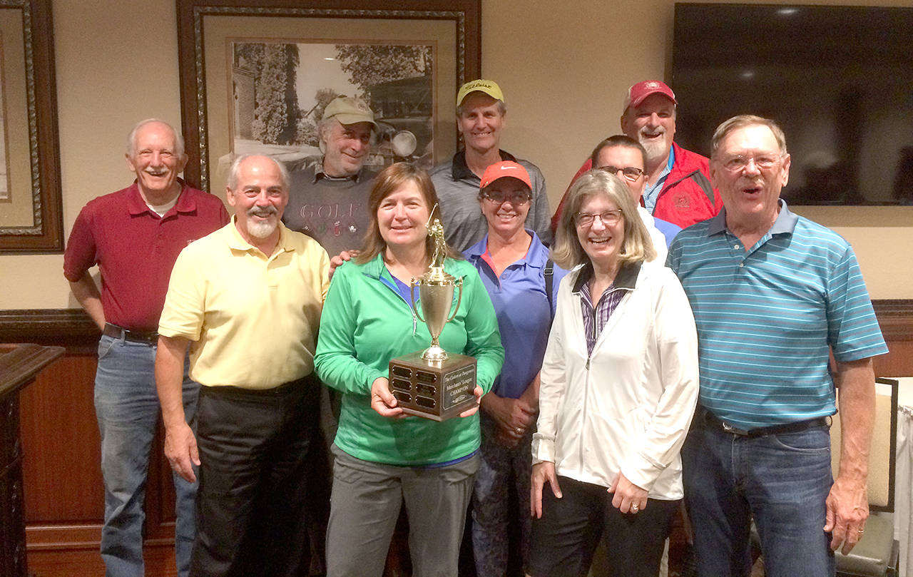 Dungeness Golf Shop claimed the Cedars at Dungeness Merchant’s League title this season. Team members are, front row from left, Barb Burrows, Lisa Ballantyne, middle row, Barry Tuteur, Jan Clendening, Richard Clendening, Ray Ballantyne and back row, Steve Lewis, Kris Lether, Jeff Jones and Vern Ahrendes. Not pictured: Steve Collatz and Rob Onnen.                                (Barry Tuteur)