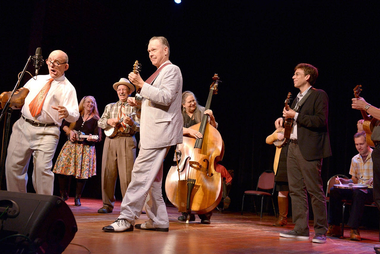 Performers at Centrum’s 2016 Ukulele Festival share a laugh on stage. (Centrum Foundation)