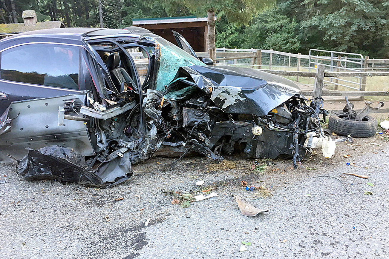 Port Angeles man suffers only minor injuries in wreck that ripped back side of car