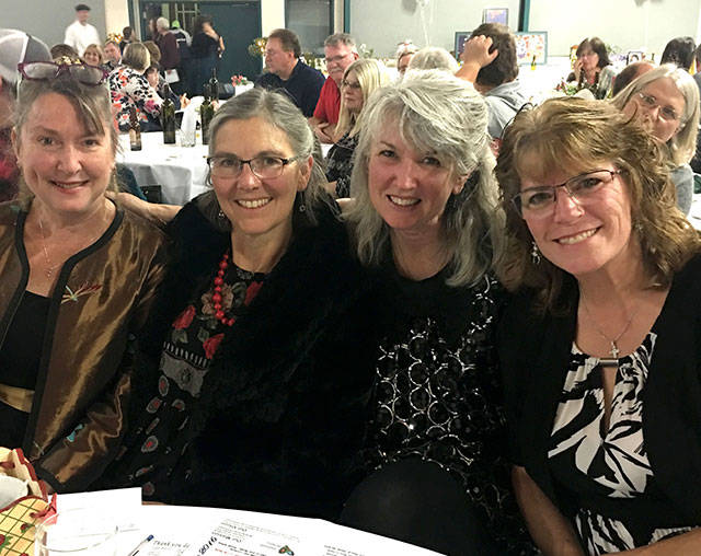 It was all smiles for Suzanne Hayden, Frances Rice, Mary Jane Duncan and Carol Lichten, from left, during last year’s Tour of Italy Gala event, which raised $27,000 for Clallam Mosaic.