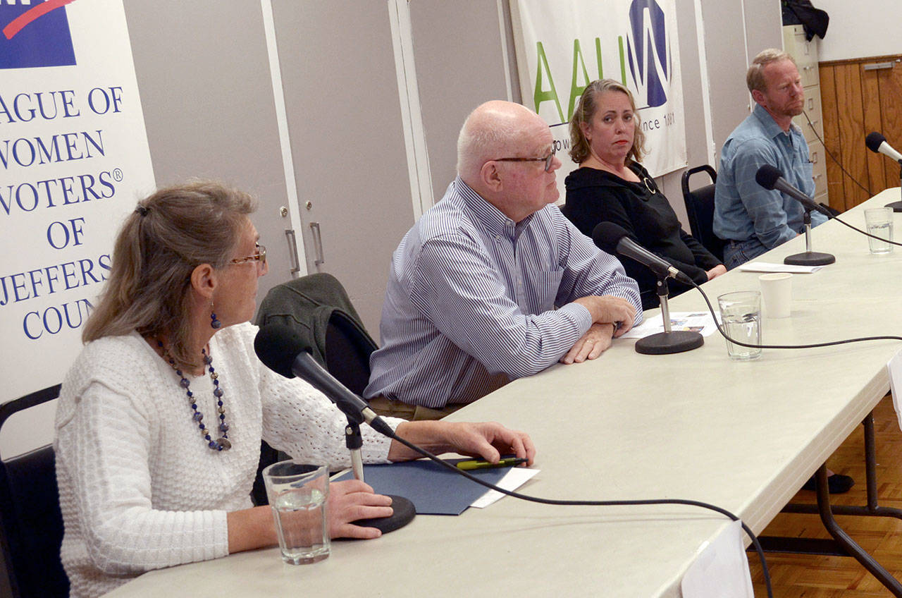 From left, Wilma Hackman and Jack McKay, both running for school board director District 5, and school board director District 1 candidates Sarah Martin and Ron Riggle, answer questions from the community at a candidate forum in Chimacum. (Cydney McFarland/Peninsula Daily News)