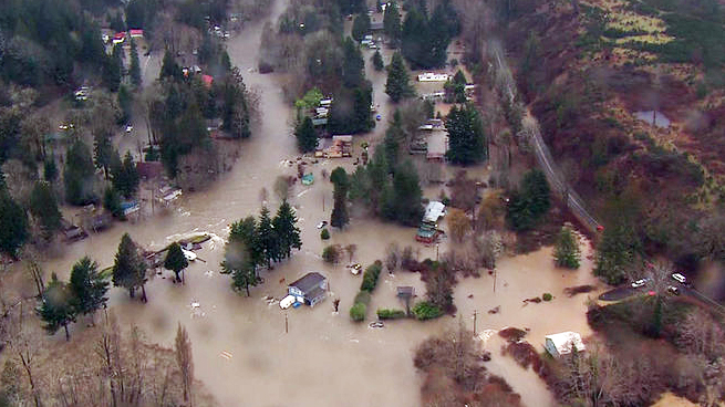 The Brinnon-area neighborhood over which the Duckabush River overflowed its banks today. (KOMO News)