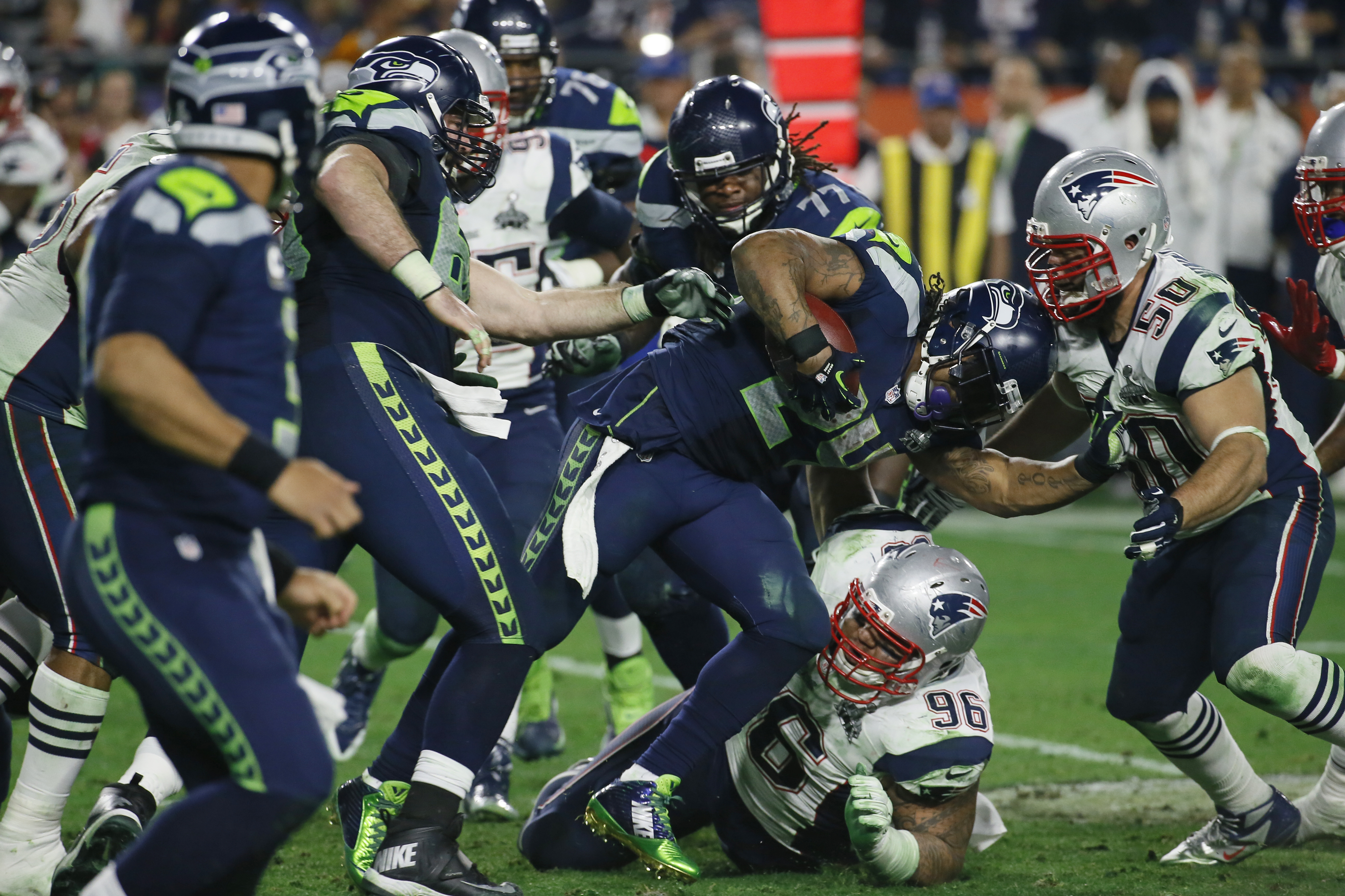 Seattle Seahawks running back Marshawn Lynch (24) looks over at