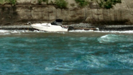 The 32-foot Ella Bella aground Thursday three miles east of Port Angeles. (U.S. Coast Guard/Port Angeles)