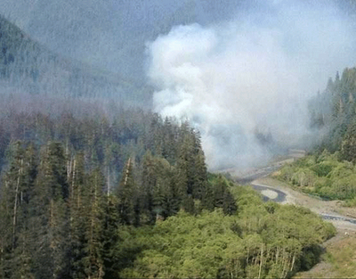 Smoke in the Queets River valley near the river's confluence with Paradise Creek. Smoke from the slow-moving fire in old-growth is expected to rise for most of the summer