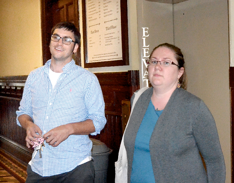 Port Townsend City Council candidates Paul Rice and Amy Smith await the vote totals Tuesday night.. Charles Bermant/Peninsula Daily News